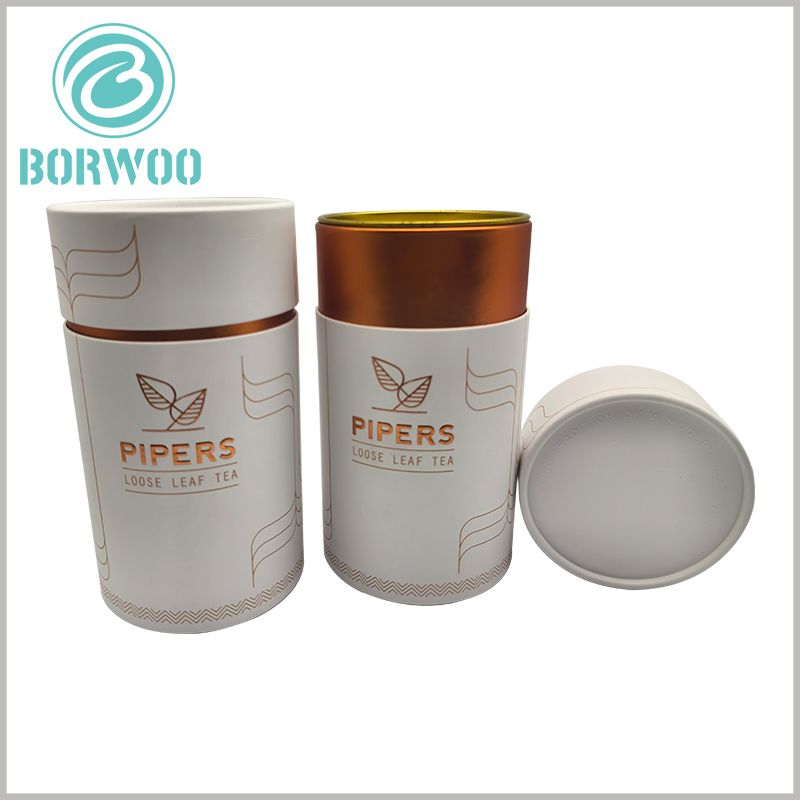 250g loose leaf tea packaging tube boxes, use bronze gold embossed printing, and the inner tube of the paper tube is also decorated with bronze gold printed paper.