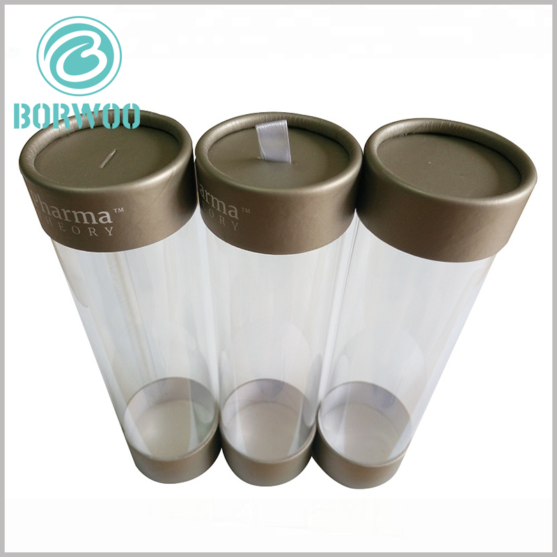 https://www.tube-boxes.com/wp-content/uploads/custom-clear-plastic-tube-packaging-with-paper-lids.jpg