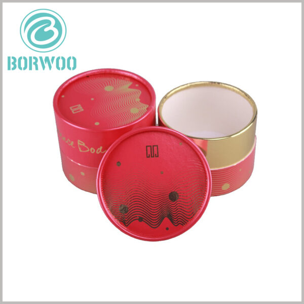 red cardboard tube packaging with logo for cosmetics.the outer wall of the inner tube is gold cardboard, increasing the luxury of packaging
